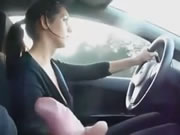 Greek girlfriend gives her boyfriend handjob while driving